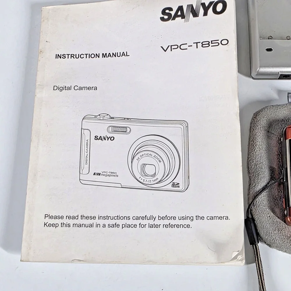 Sanyo VPC-T850 CP Digital Camera Orange w/Pouch, Battery, 2GB SD Card, Charger